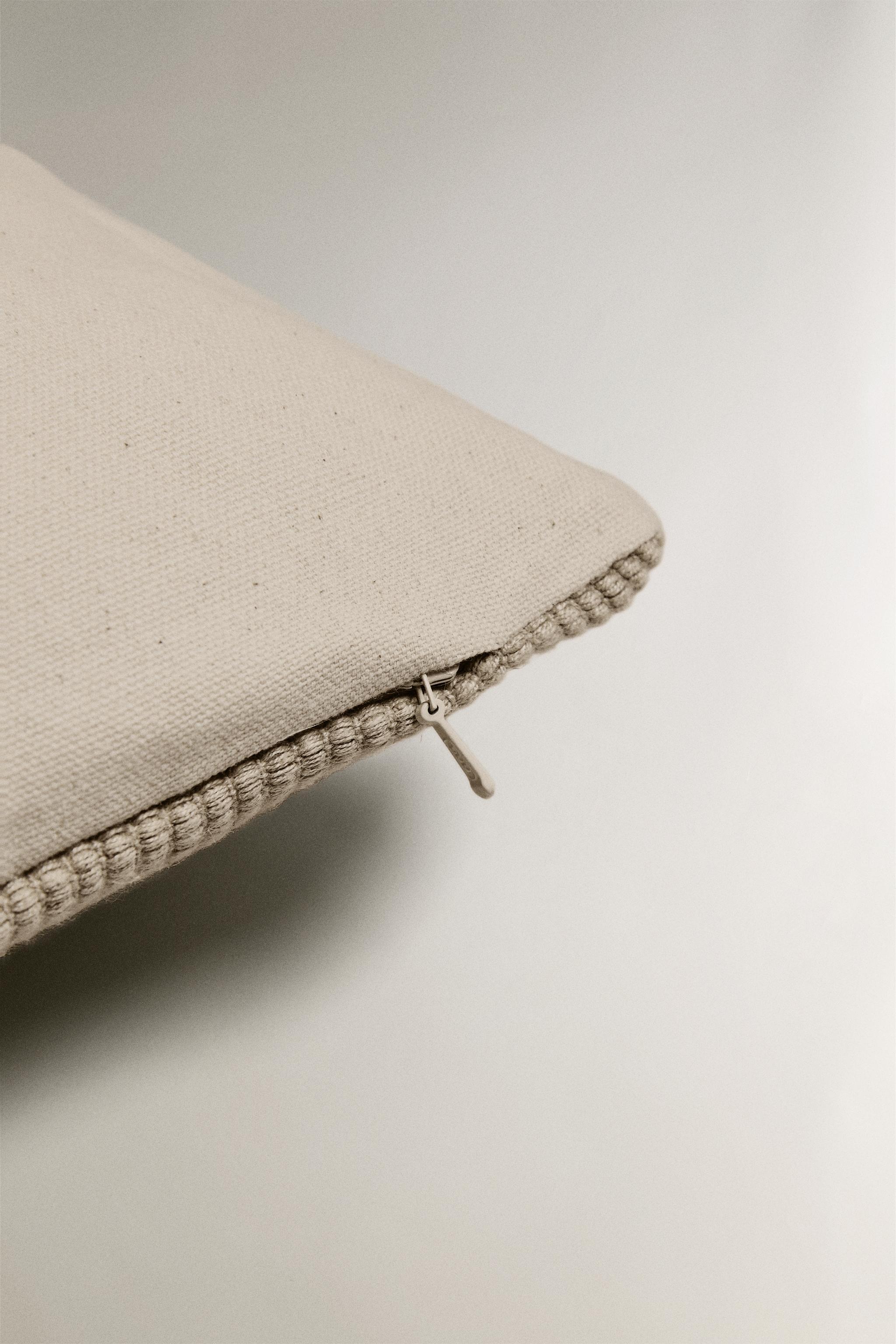 HOUSSE DE COUSSIN TRESSÉE